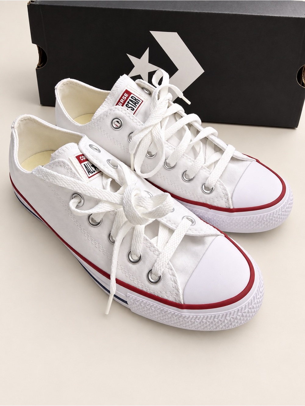 Converse White Low Top Sneakers with Red & Blue Trim